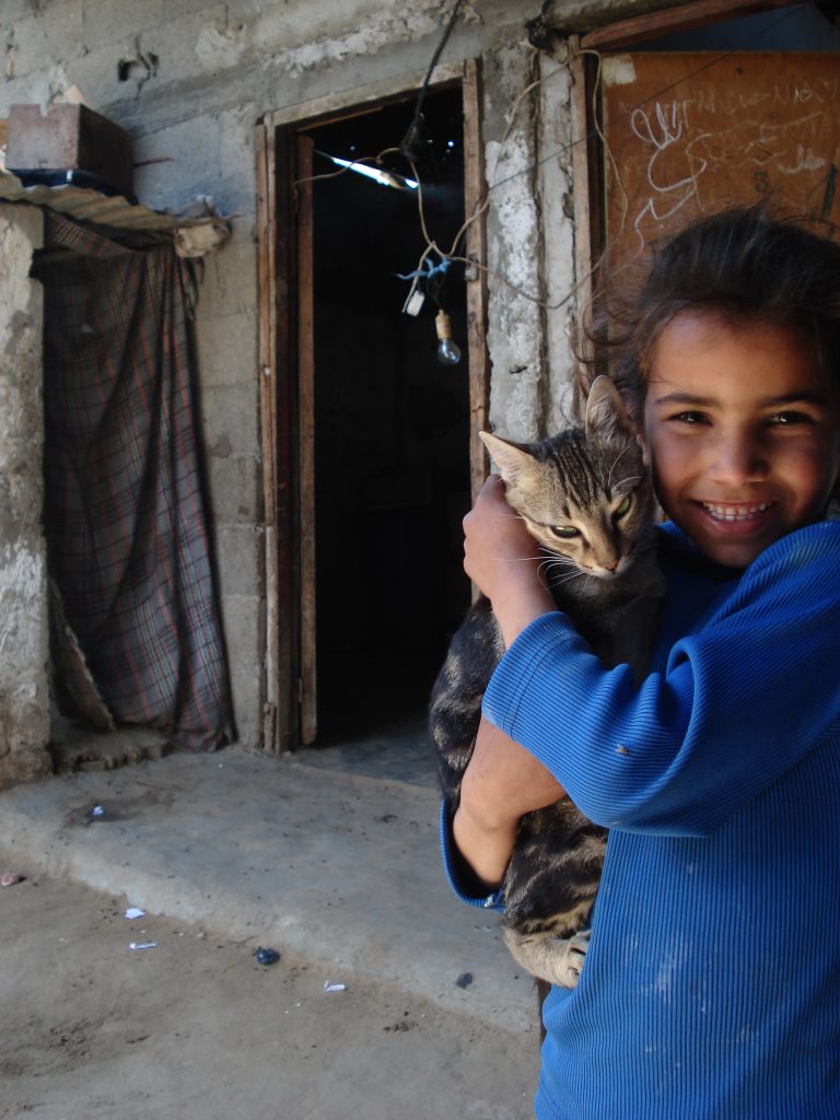 Bedouin girl with cat